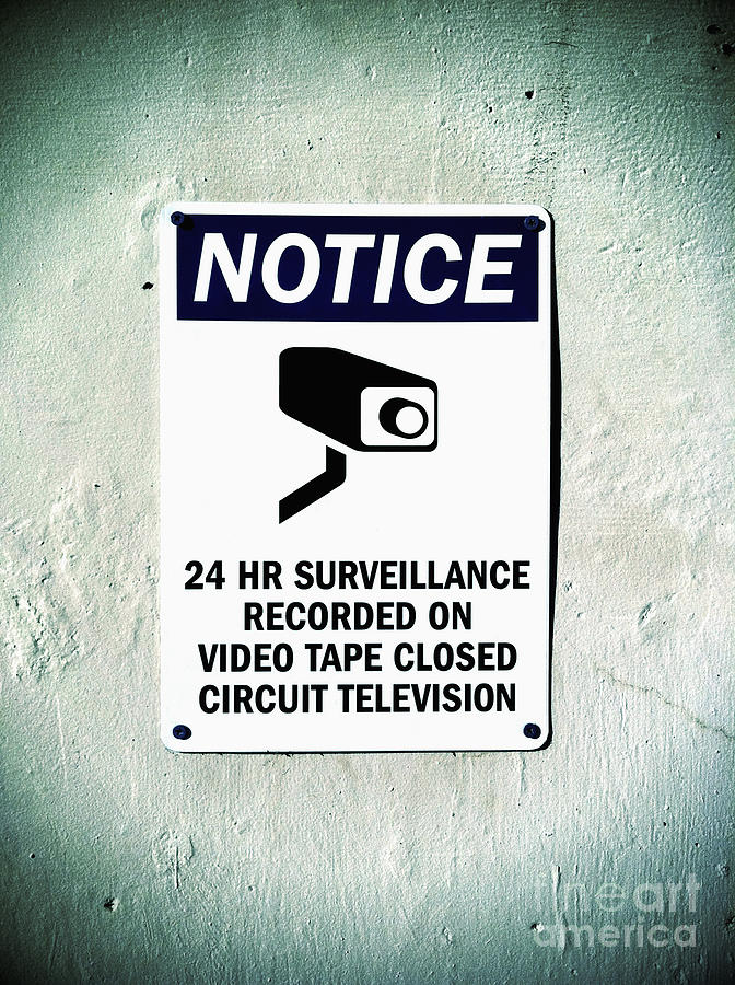 Surveillance Sign on Concrete Wall Photograph by Bryan Mullennix