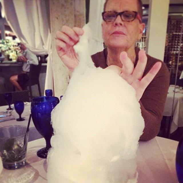 Genius Photograph - Susan Studying Her Cotton Candy Dessert by Diane Zanner