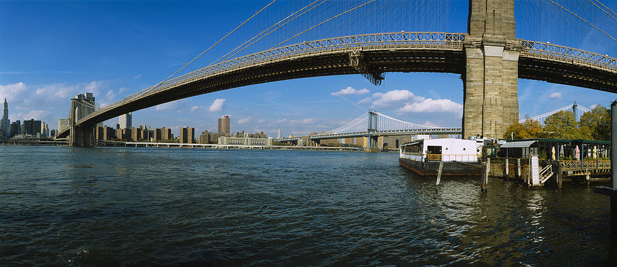 Brooklyn Bridge Photograph - Suspension Bridge Across A River by Panoramic Images