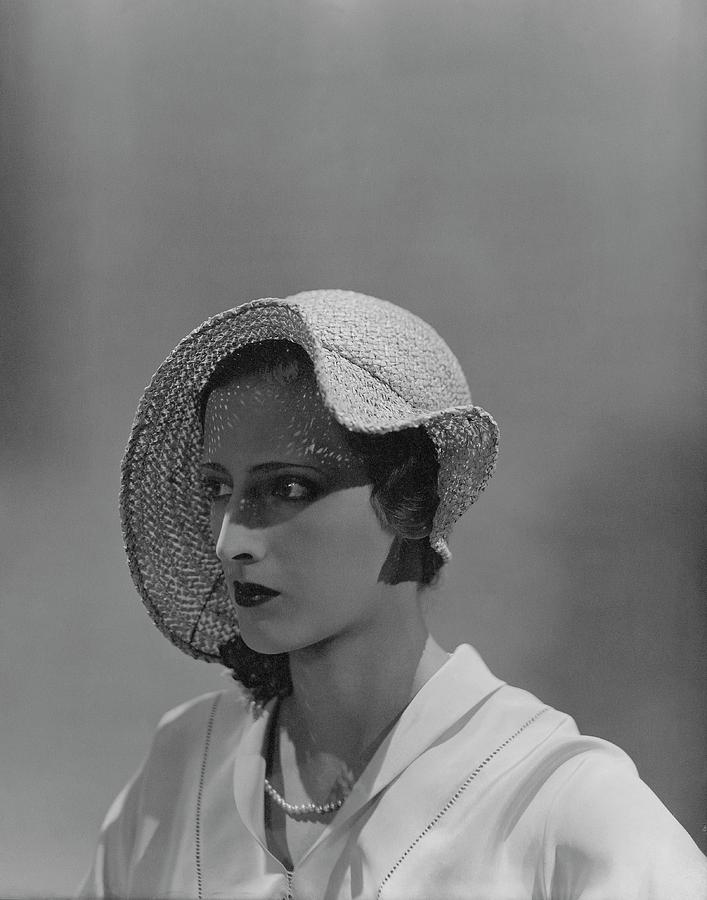 Suzette Salen Wearing A Printanier Straw Hat Photograph by George Hoyningen-Huene