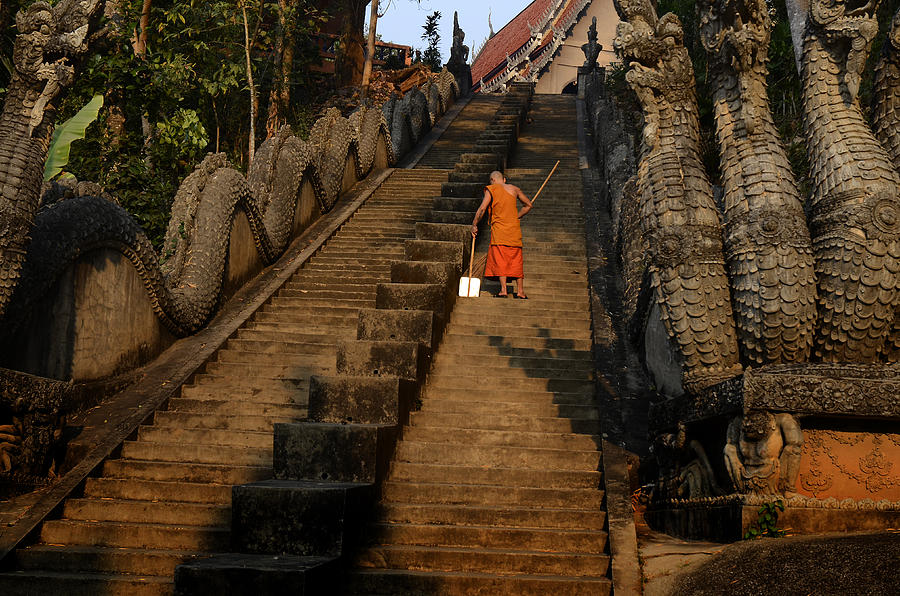 Buddha Photograph - Sweeping the Temple Steps by Duane Bigsby