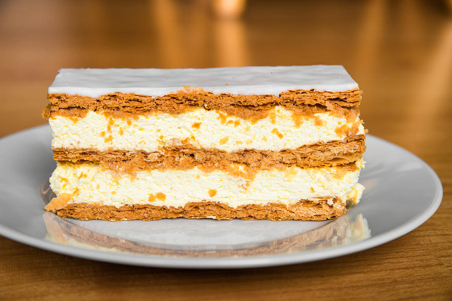 Sweet and tasty slice of cream cake Photograph by Matthias Hauser