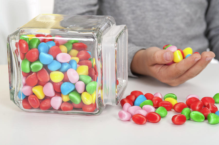 Sweets Spilling Onto Table Photograph by Lea Paterson/science Photo ...