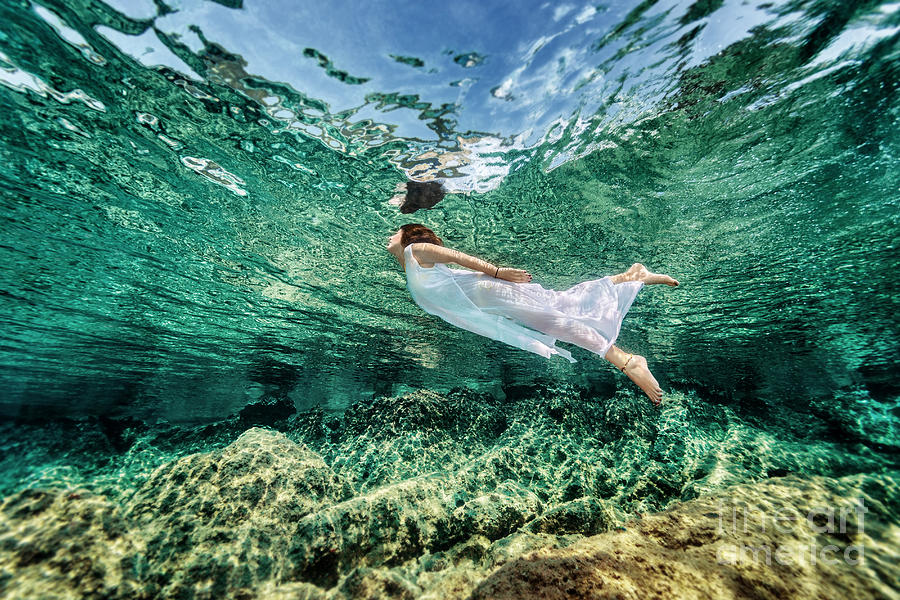 Swimming in transparent sea Photograph by Anna Om