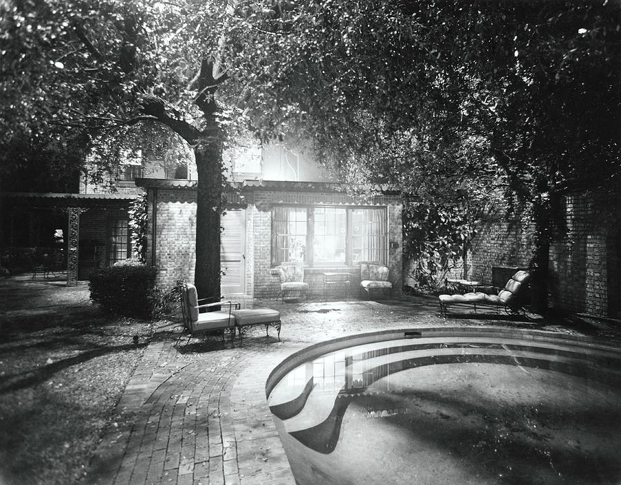 Swimming Pool In Garden At Night Photograph by William Grigsby