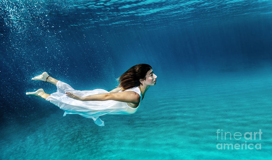 Swimming underwater Photograph by Anna Om