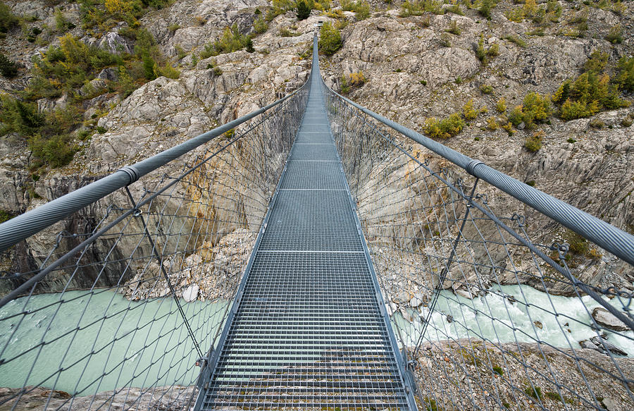 Swing bridge Massaschlucht Swiss Alps Switzerland Photograph by Matthias Hauser
