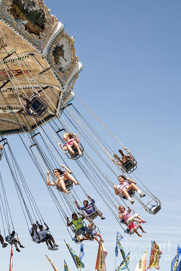 Swing Carousel at a County Fair Photograph by William Kuta