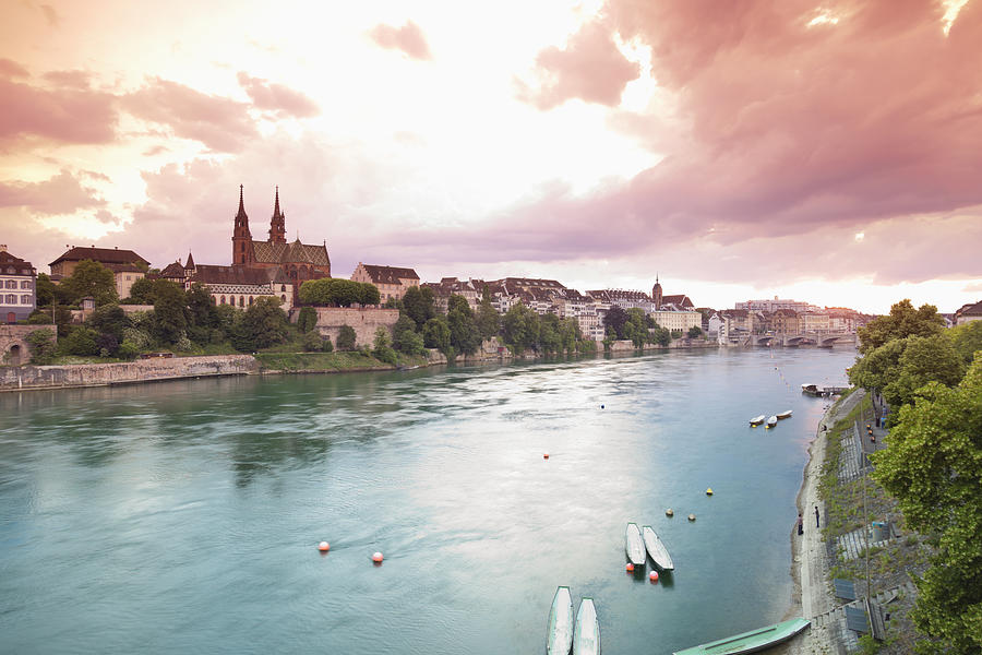 Switzerland, Basel, View of Basel Munster and old town at sunset Photograph by Westend61