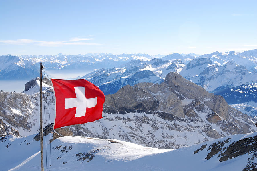 Switzerland Flagg Over Swiss Alps Photograph by Assalve