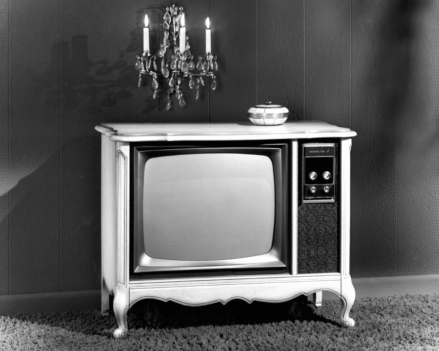 Black And White Photograph - Sylvania Electric Products introduces its 1970 color television by Underwood Archives