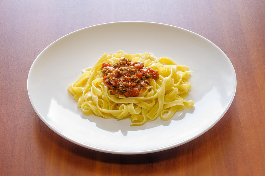 Tomato Photograph - Tagliatelle Bolognese Sauce by Alain De Maximy