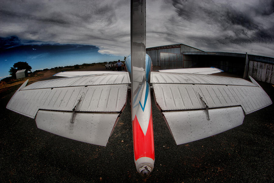 Airplane Photograph - Tail Clouds by Paul Job