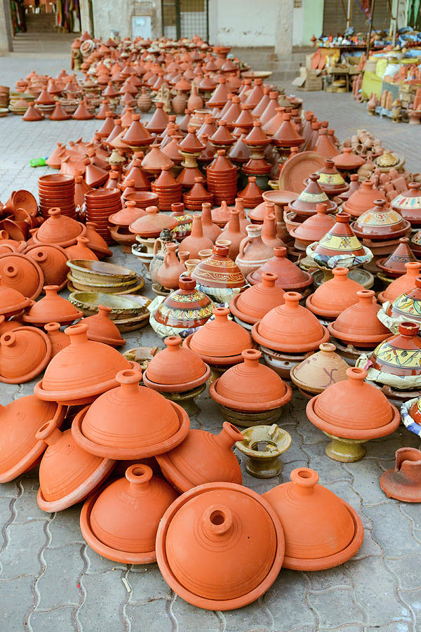 Tajine Pottery Stacked In A Market Photograph by Paolo Negri