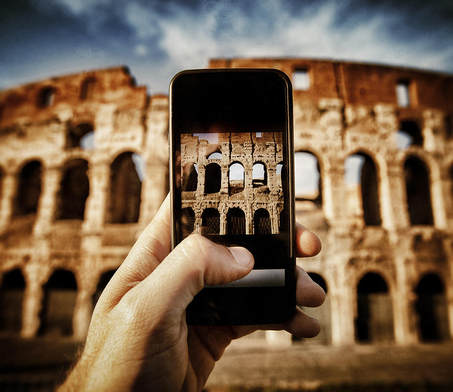 Taking pictures of the Coliseum with smartphone Photograph by Piola666