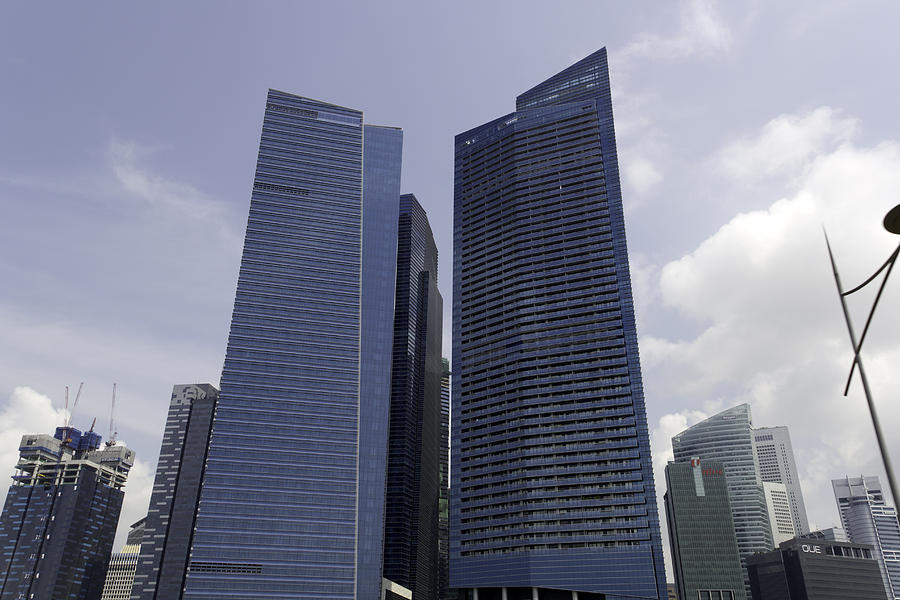 Tall buildings in the financial district of Singapore Photograph by Ashish Agarwal
