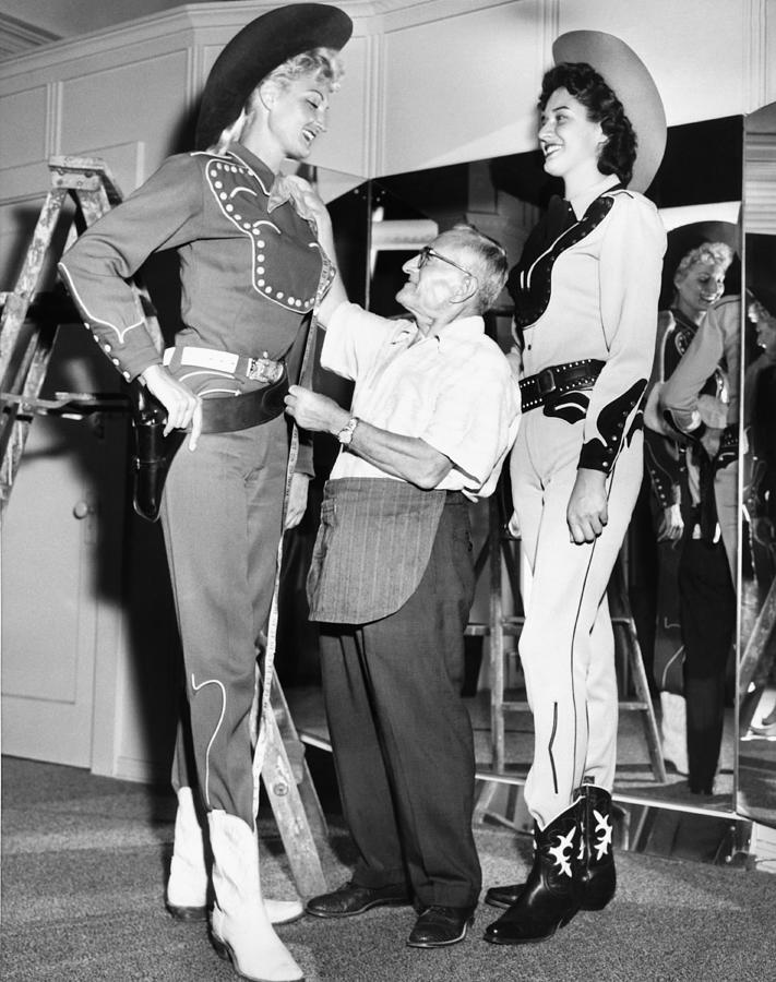 Hollywood Photograph - Tall Cowgirls Get Fitted by Underwood Archives