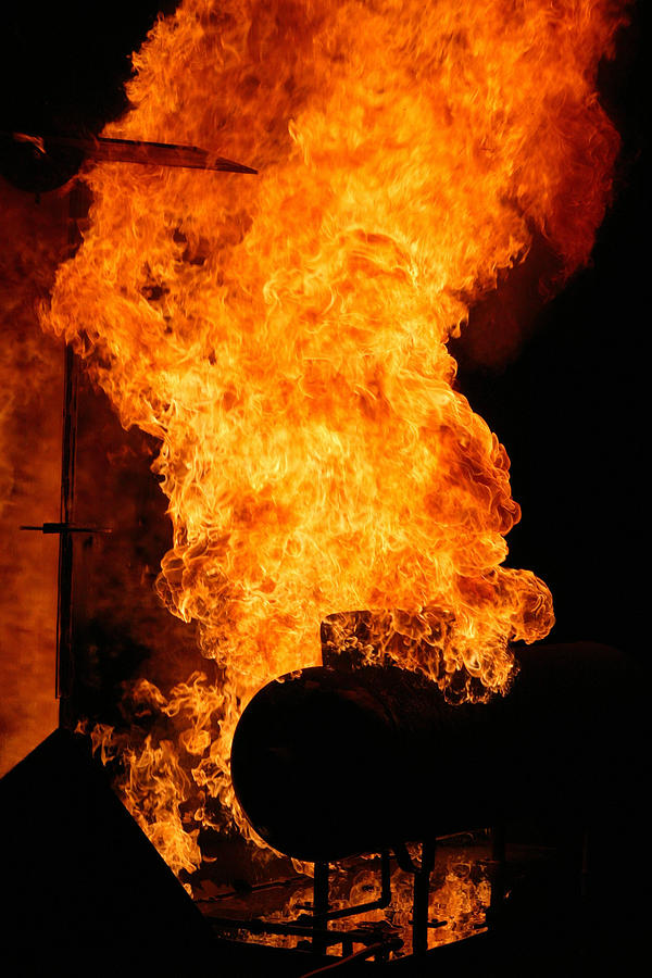 Tank on fire Photograph by Henry Inhofer