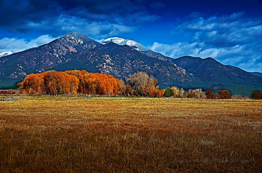 Taos in the Fall Photograph by Charles Muhle