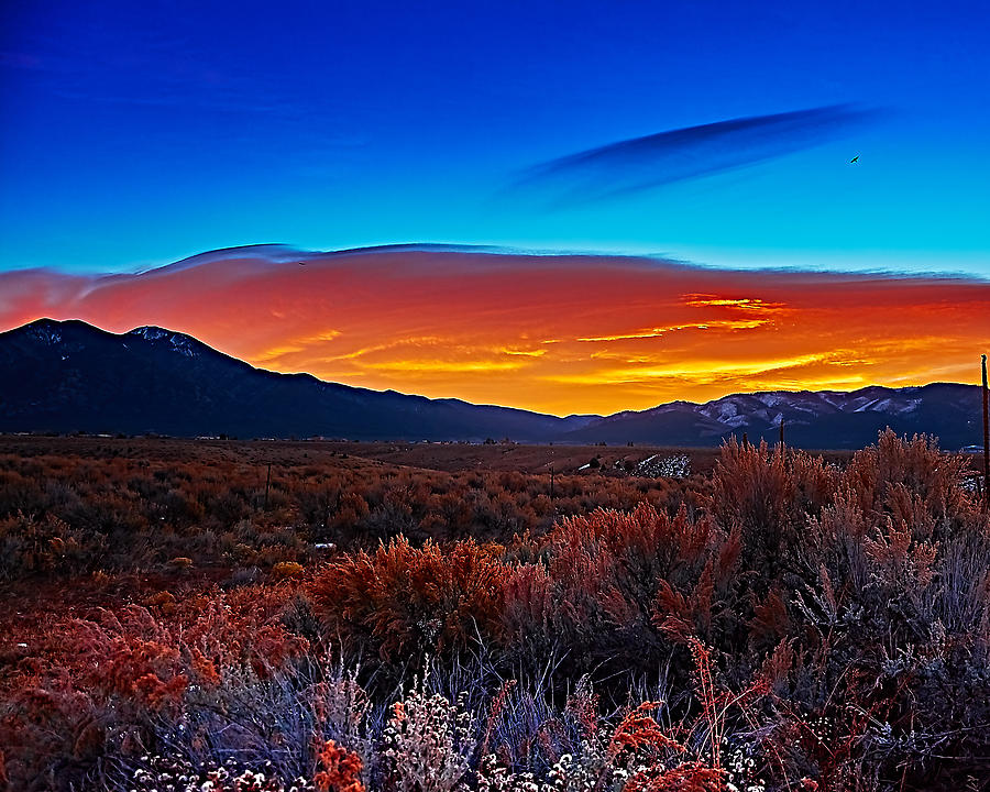 Taos sunrise X Photograph by Charles Muhle
