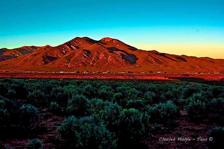 Taos sunset Photograph by Charles Muhle