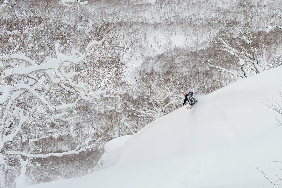 Nature Photograph - Taro Tamai Snowboarding At Niseko by Brandon Huttenlocher