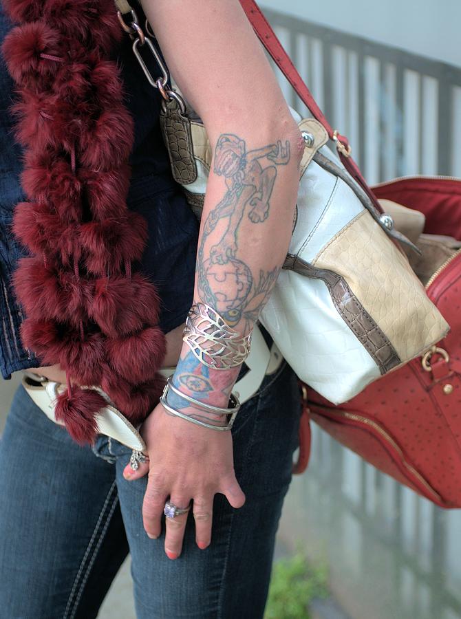 Tattoo and handbags Photograph by Douglas Pike