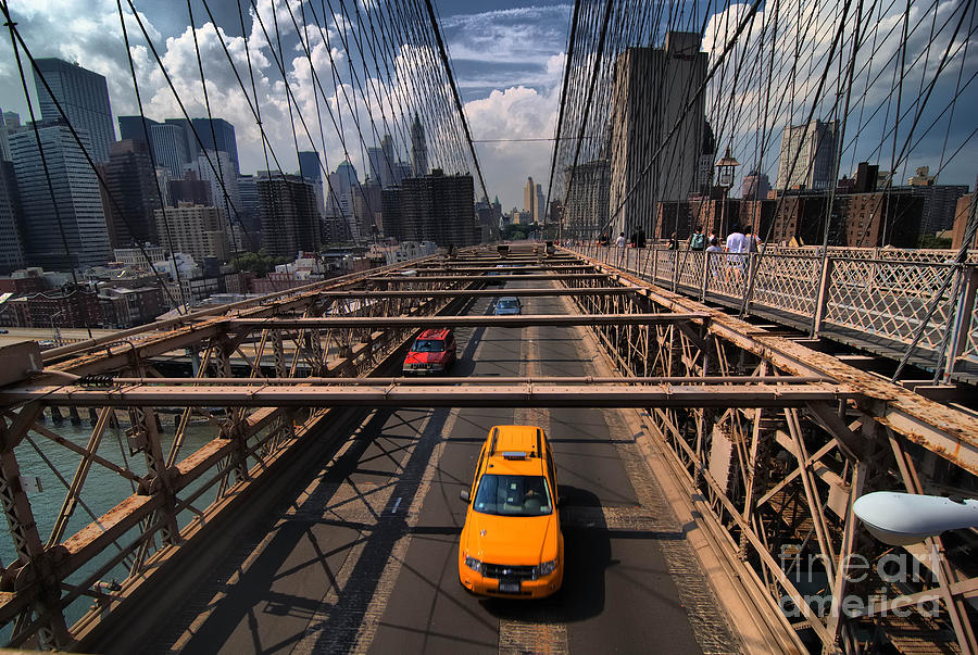Brooklyn Bridge Photograph - Taxi Crossing the Brooklyn Bridge by Amy Cicconi