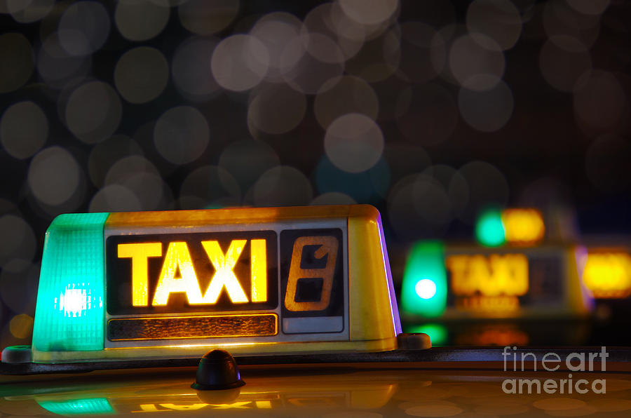 Taxi signs Photograph by Carlos Caetano