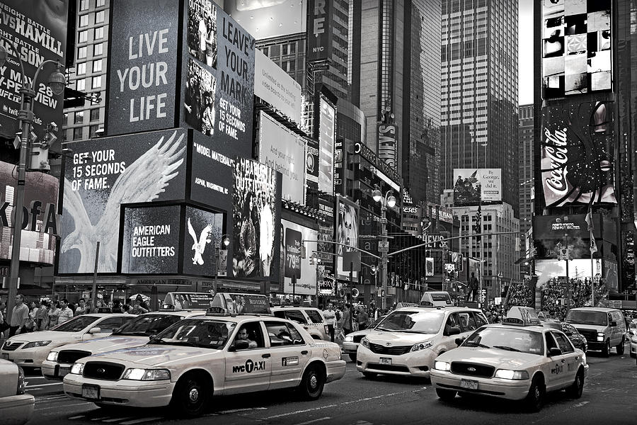 Taxis in Times Square Photograph by Dominique Dubied