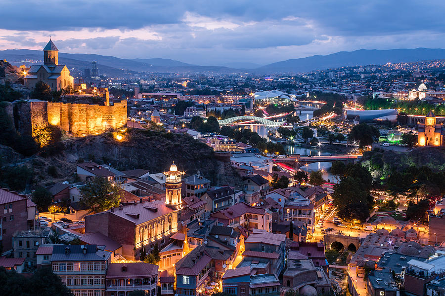 Tbilisi (Republic of Georgia) at dusk Photograph by Frans Sellies