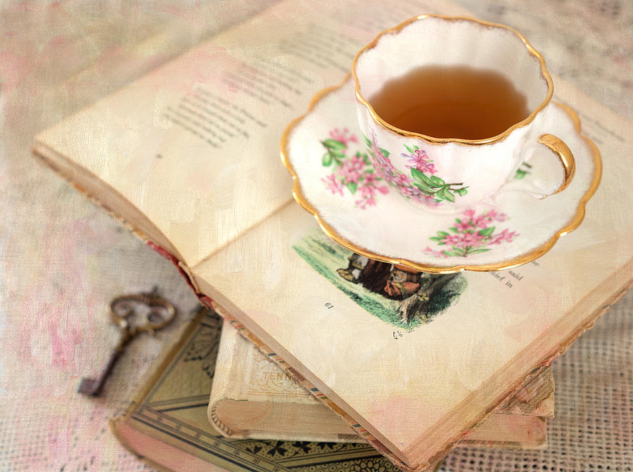 Tea Cup And Vintage Books Photograph