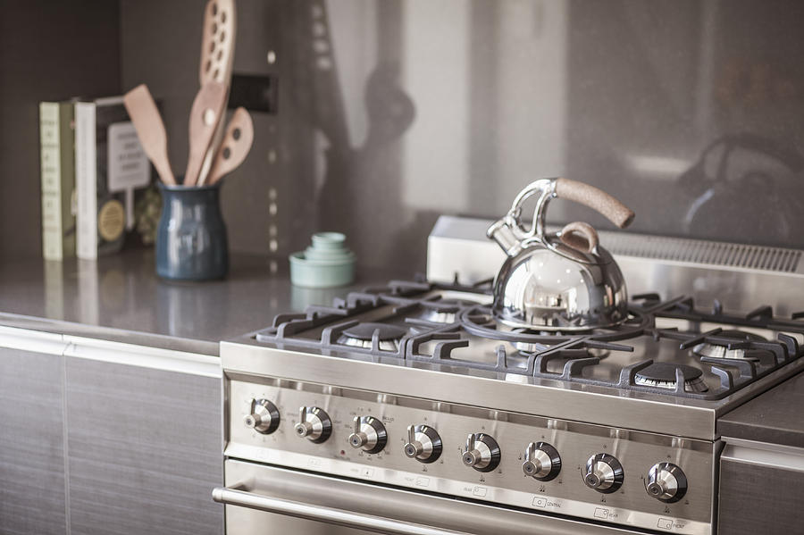 Tea kettle on the stove Photograph by Alberto Guglielmi