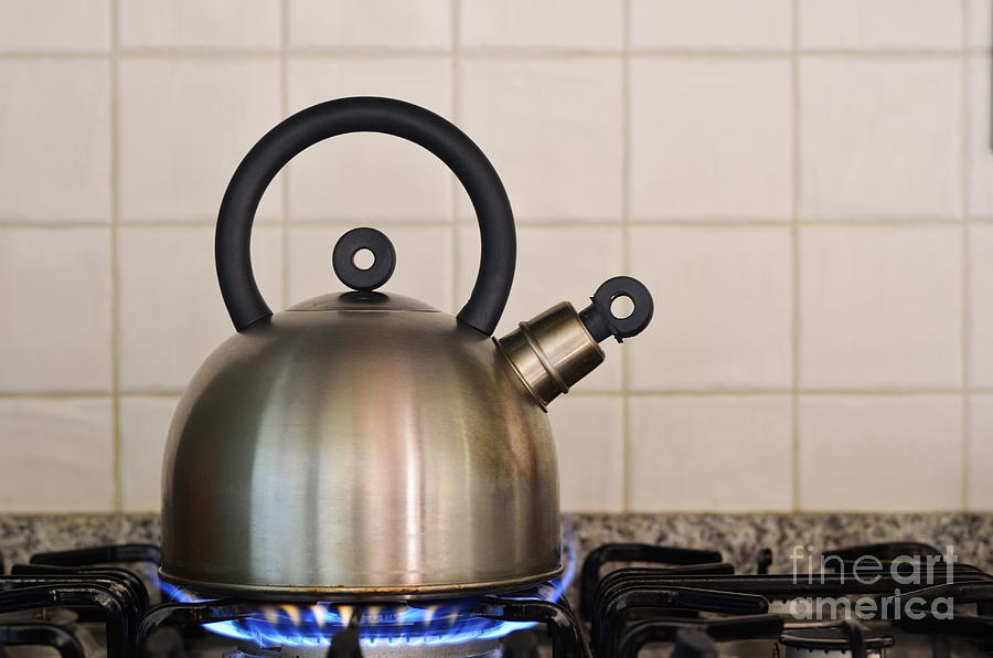 Teapot on gas stove burner Photograph by Sami Sarkis - Fine Art America