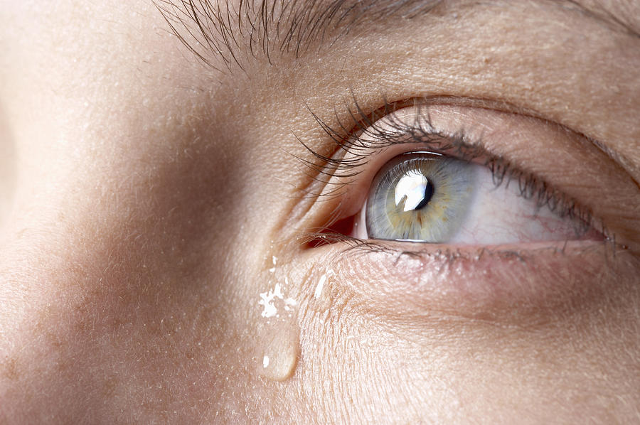 Tear Falling From Womans Eye, Close-up Photograph by Pierre Bourrier Tear Falling From Womans Eye, Close-up Photograph by Pierre Bourrier