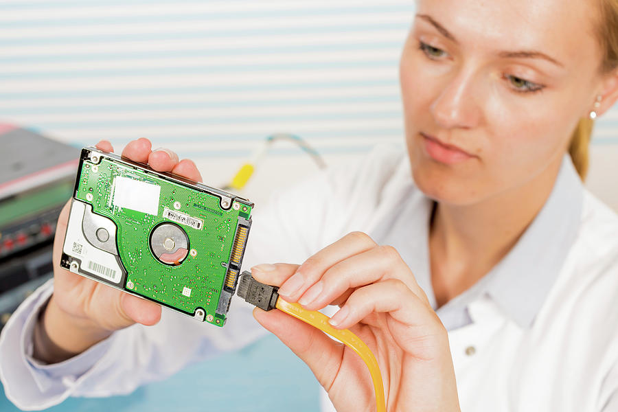 Technician Repairing Circuit Board Photograph by Wladimir Bulgar ...