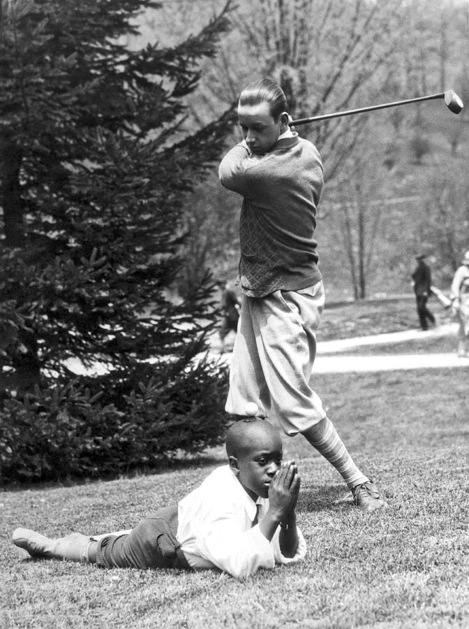 Teeing Off Head Of Caddy Photograph by Underwood Archives