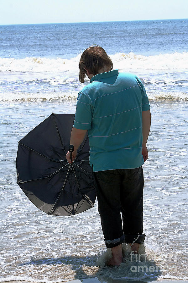 Teen with Umbrella Facing the Ocean Photograph by Susan Stevenson