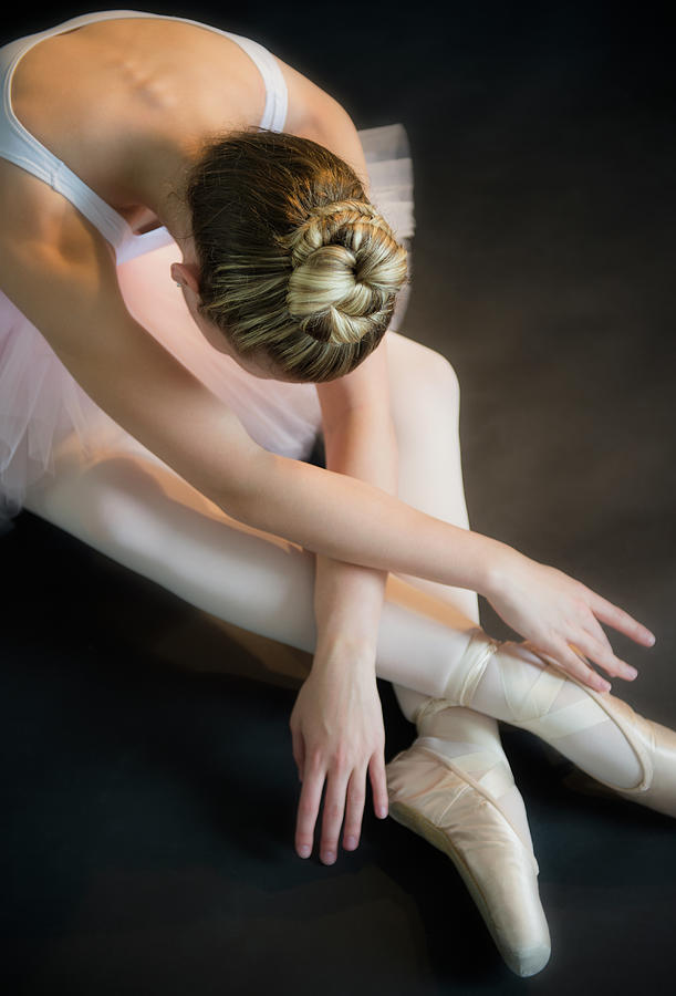 Teenage 16-17 Ballerina Bending Over Photograph by Jamie Grill