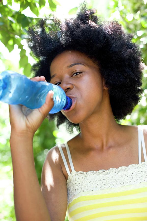 teen drinking water