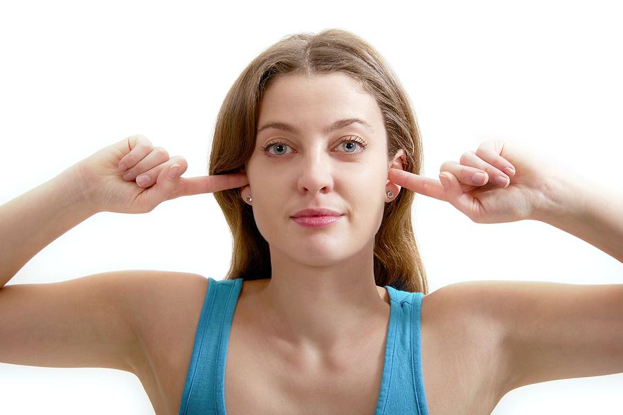 Teenage Girl With Fingers In Ears Photograph by Lea Paterson - Fine Art ...