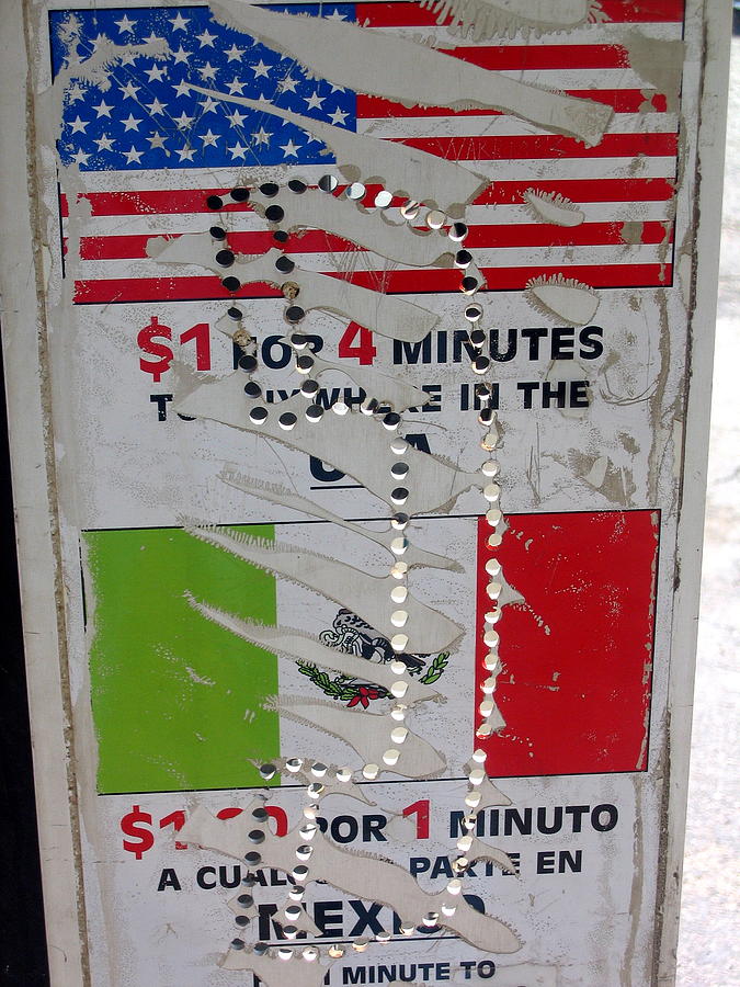 Telephone  USA Mexico one dollar four minutes booth US Mexico flags Eloy Arizona 2005 Photograph by David Lee Guss