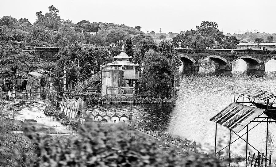 Temple by the river Photograph by John Hoey