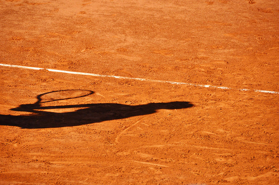 Tennis player shadow on a clay tennis court Photograph by Dutourdumonde Photography