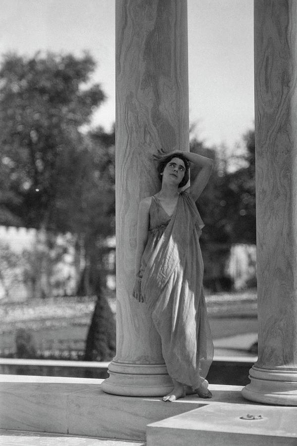 Teresa Duncan Posing Against A Column Photograph by Arnold Genthe