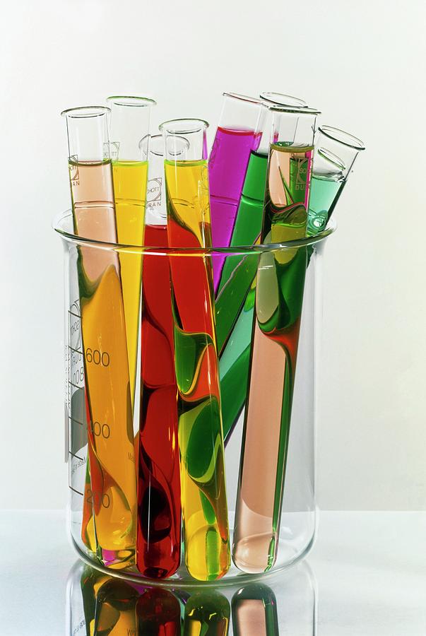 Test Tubes In A Beaker On A Reflective Surface Photograph by Rosenfeld Images Ltd/science Photo Library