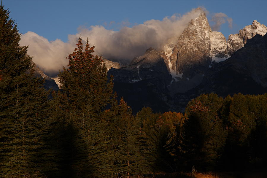 Tetons shrouded by morning clouds Photograph by Jetson Nguyen