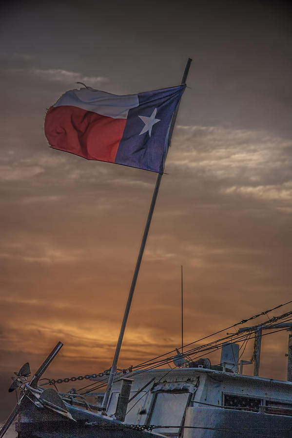 Texas Flag Flying from a Fishing Boat at Sunrise Photograph by Randall Nyhof