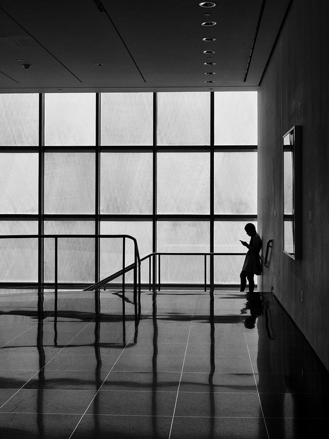 Texting at the MoMA stairs Photograph by Cornelis Verwaal