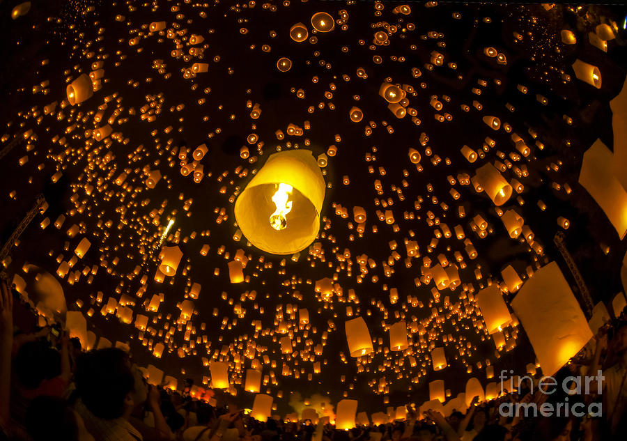 Celebrity Photograph - Thai people floating lamp by Anek Suwannaphoom